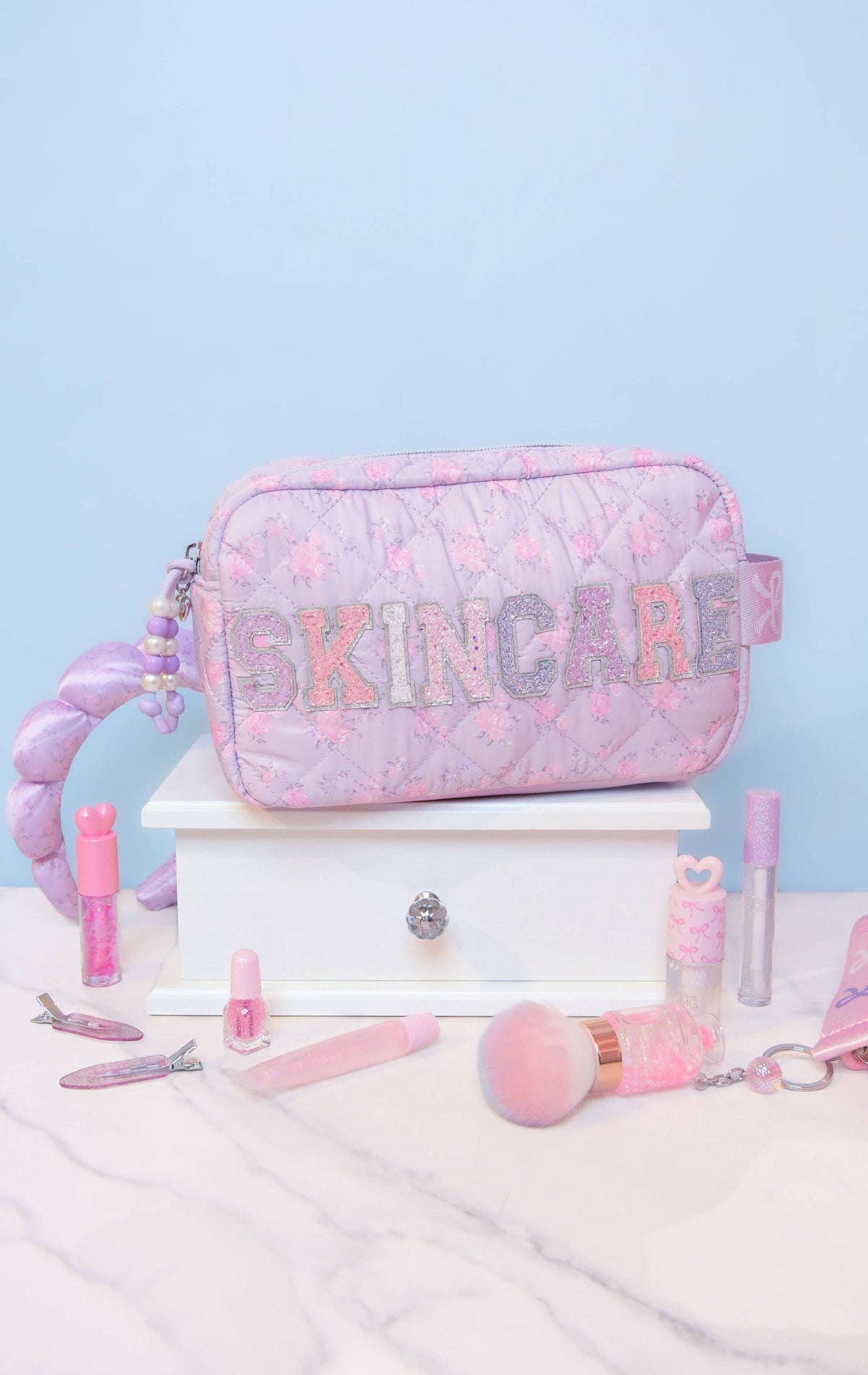 'SKINCARE' Quilted Floral Printed Pouch